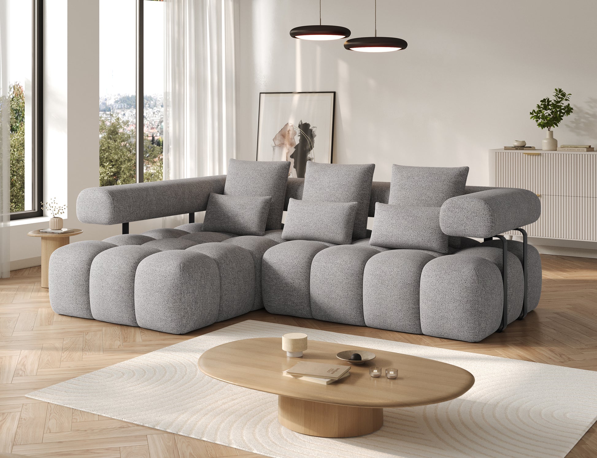 Szaro-czarny narożnik Levvi lewy ELTAP w tkaninie Coralline 03 boucle, ujęcie ukośne ukazujące całość wraz z poduszkami