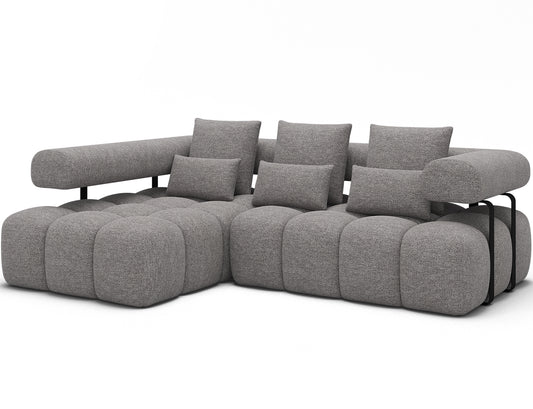 Narożnik Levvi lewy ELTAP w tkaninie Coralline 03 szaro-czarny boucle, widok ukośny na całość mebla z poduszkami