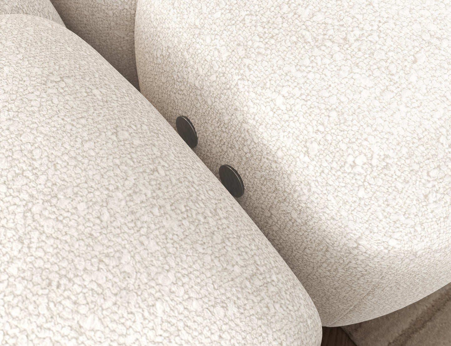 Zbliżenie struktury tkaniny Jaffray 01 w narożniku Levvi – miękka, przyjemna w dotyku bouclé w eleganckim odcieniu bieli.