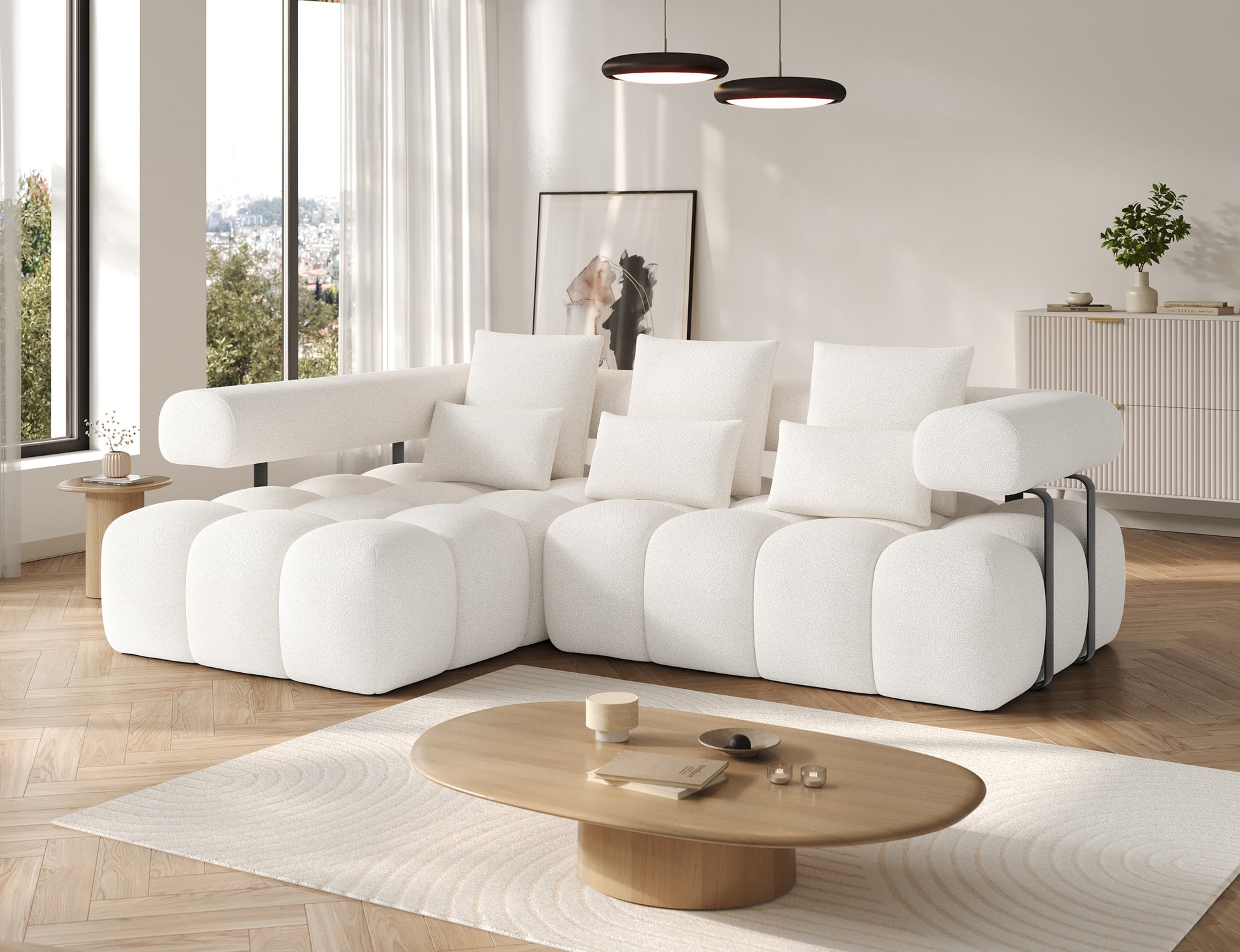 Narożnik Levvi lewy w tkaninie Jaffray 01 białej – elegancki mebel o miękkiej formie i stylowym metalowym wykończeniu boków.