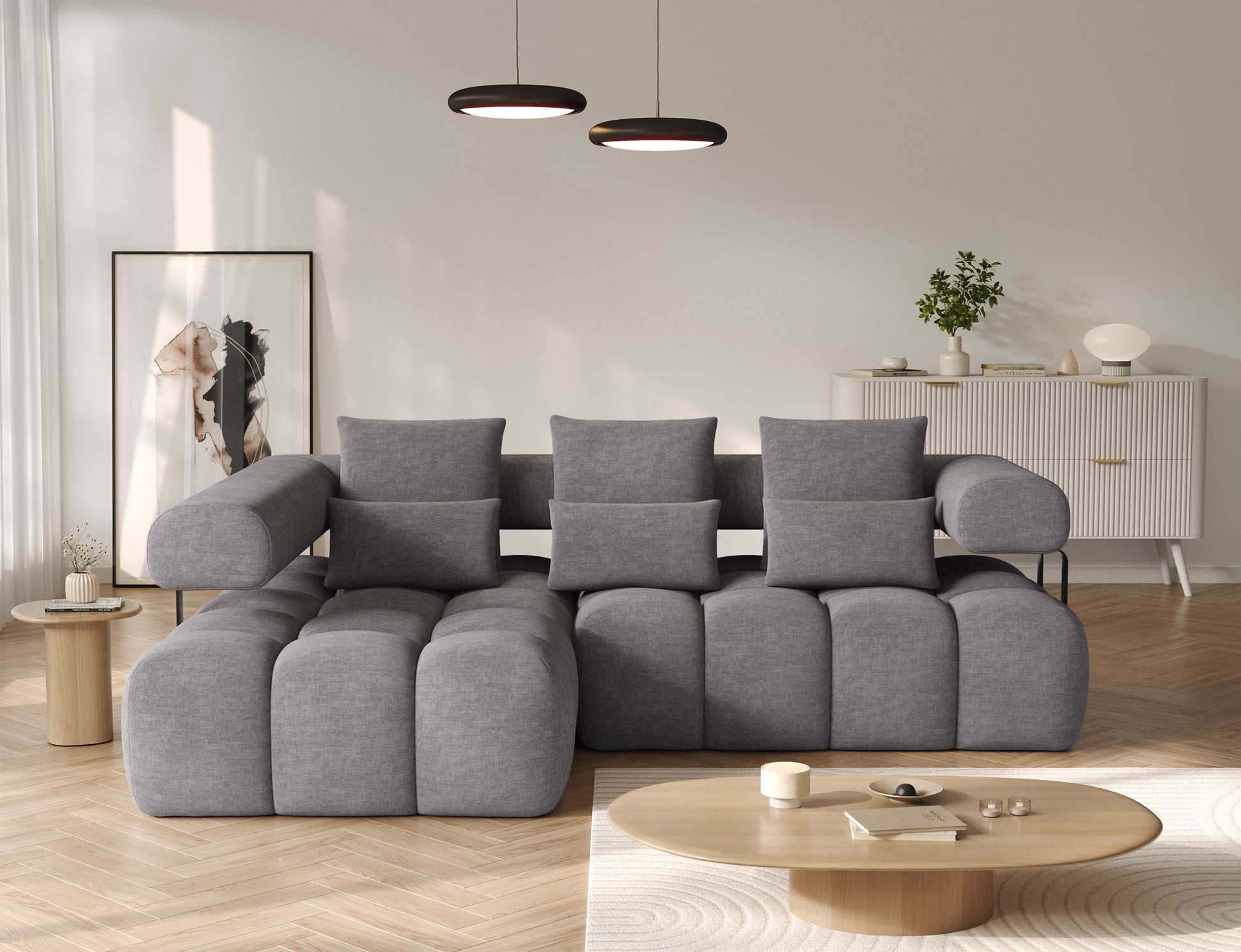 Frontowy widok narożnika Levvi ELTAP w jasnoszarym welurze easy clean, komfortowe poduchy, czarne nogi, funkcja spania Relax