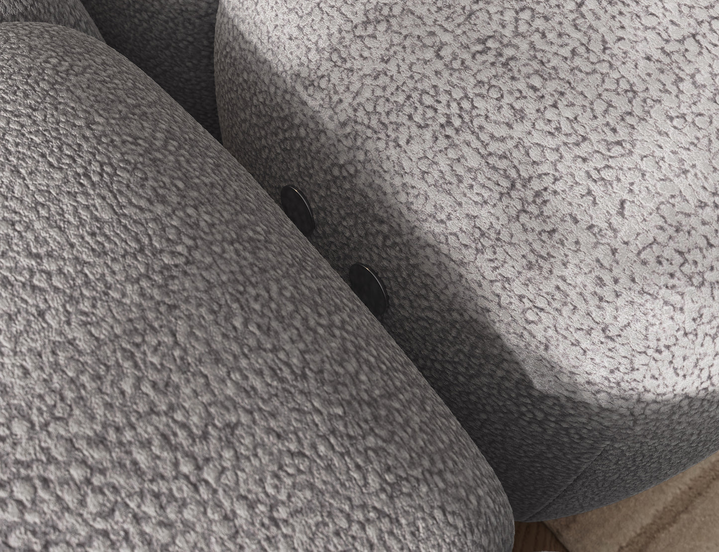 Detal narożnika Levvi lewy Paolli 04 szary – zbliżenie na tkaninę o strukturze boucle podkreślającą elegancję i miękkość mebla.