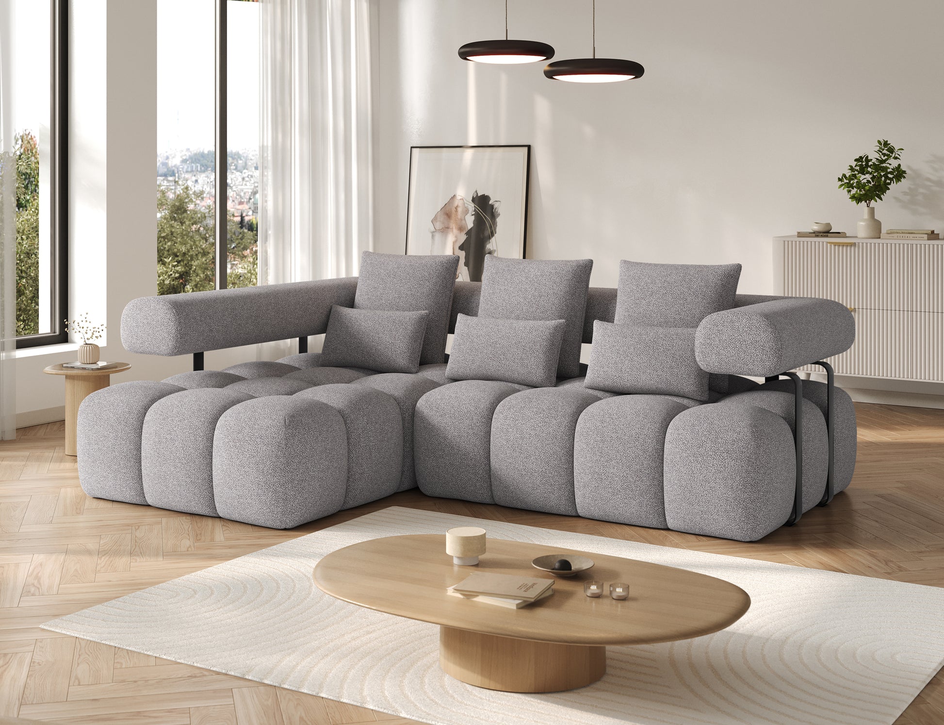 Narożnik Levvi lewy Paolli 04 szary – widok pod skosem, nowoczesny design, miękkie moduły i eleganckie wykończenie tkaniny boucle.