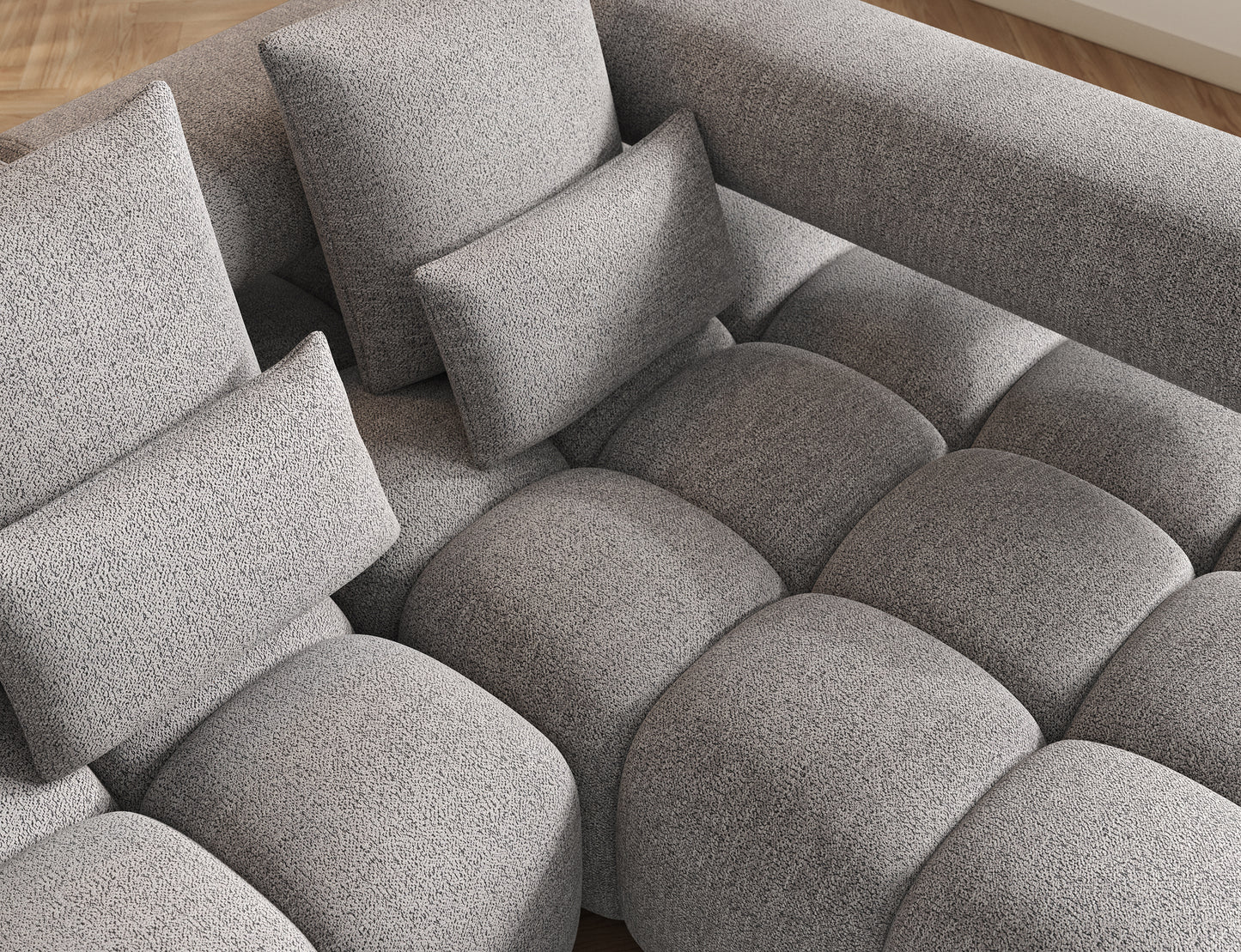 Widok z góry na siedzisko narożnika Levvi prawy ELTAP w tkaninie boucle Coralline 03 szaro-czarnej, miękkie poduchy.