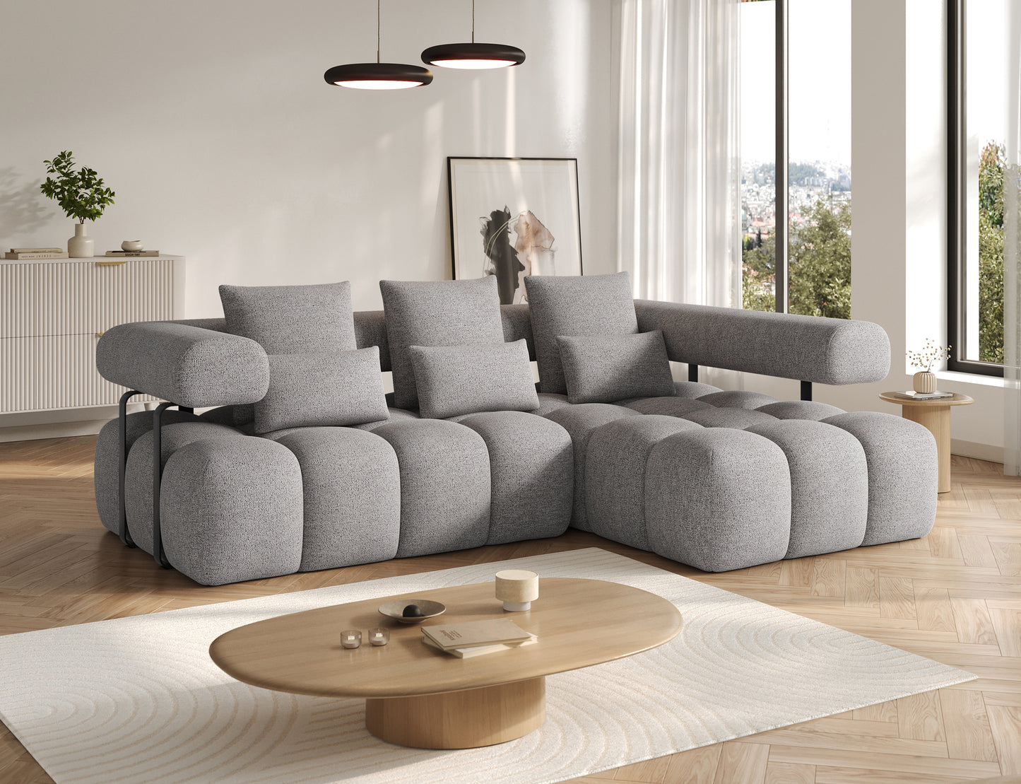 Narożnik prawy Levvi ELTAP w tkaninie boucle Coralline 03 szaro-czarnej, nowoczesna bryła, widok pod lekkim skosem.