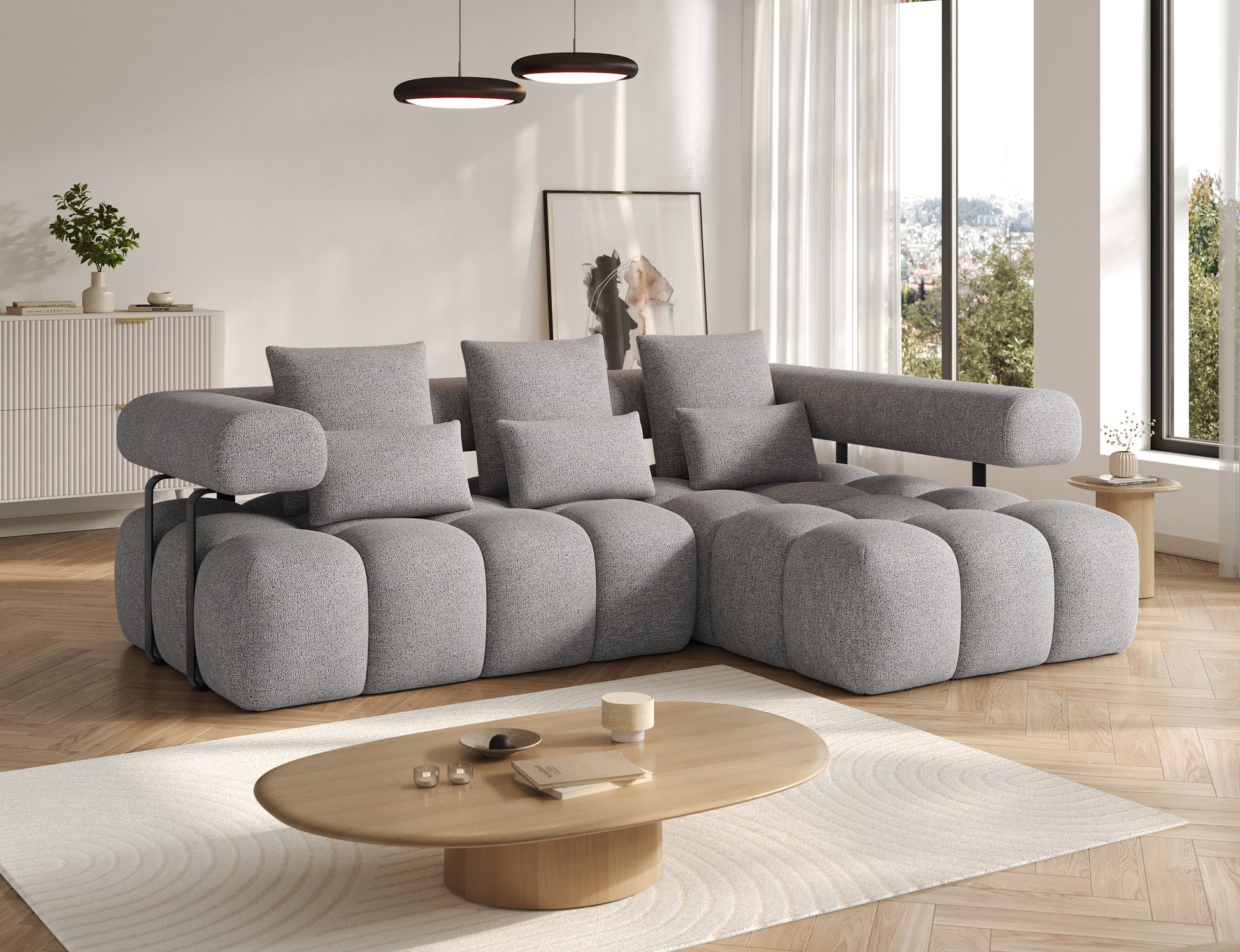 Narożnik prawy Levvi ELTAP w tkaninie boucle Coralline 03 szaro-czarnej, nowoczesna bryła, widok pod lekkim skosem.