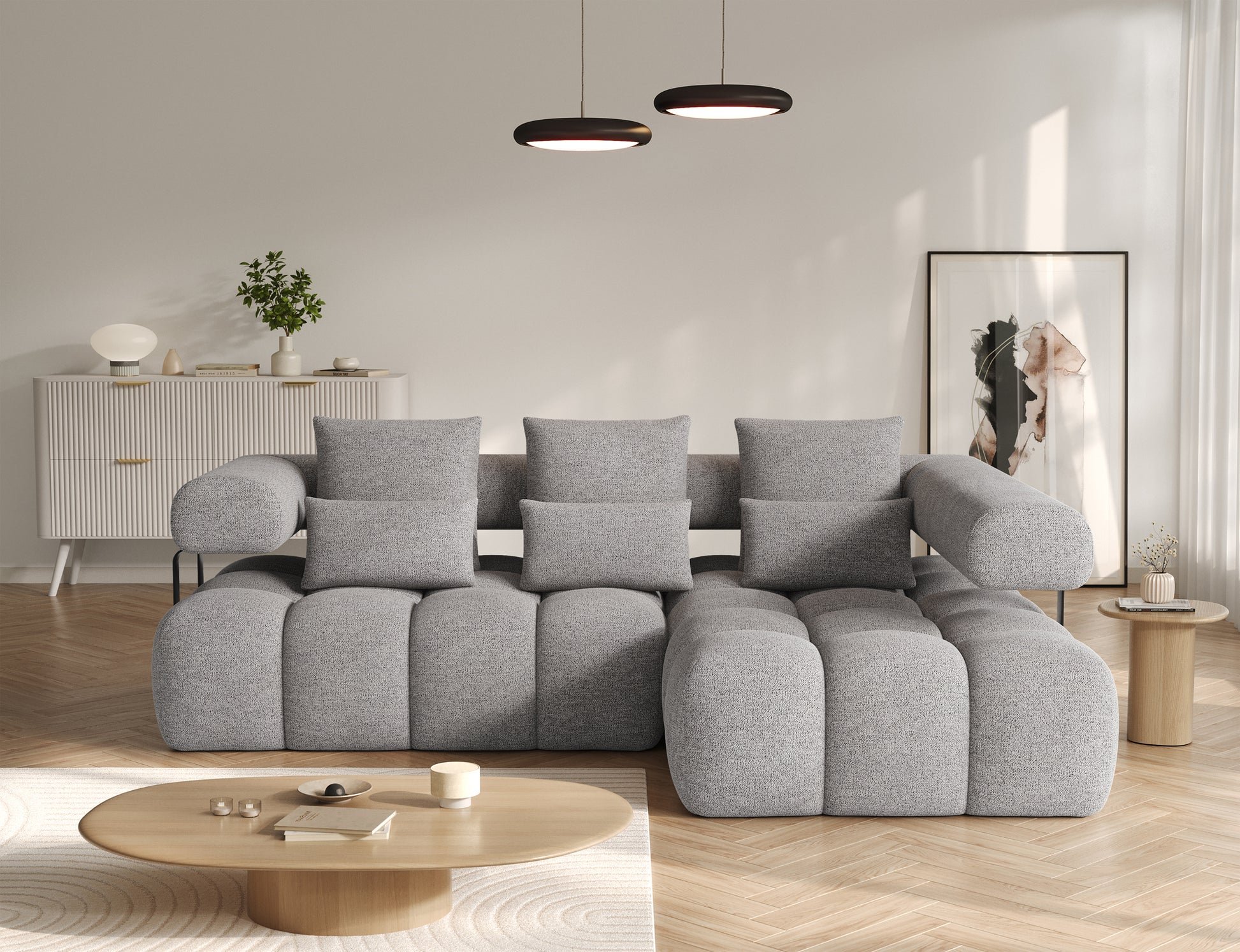 Narożnik prawy Levvi ELTAP w tkaninie boucle Coralline 03 szaro-czarnej, nowoczesny design, widok od frontu w salonie.