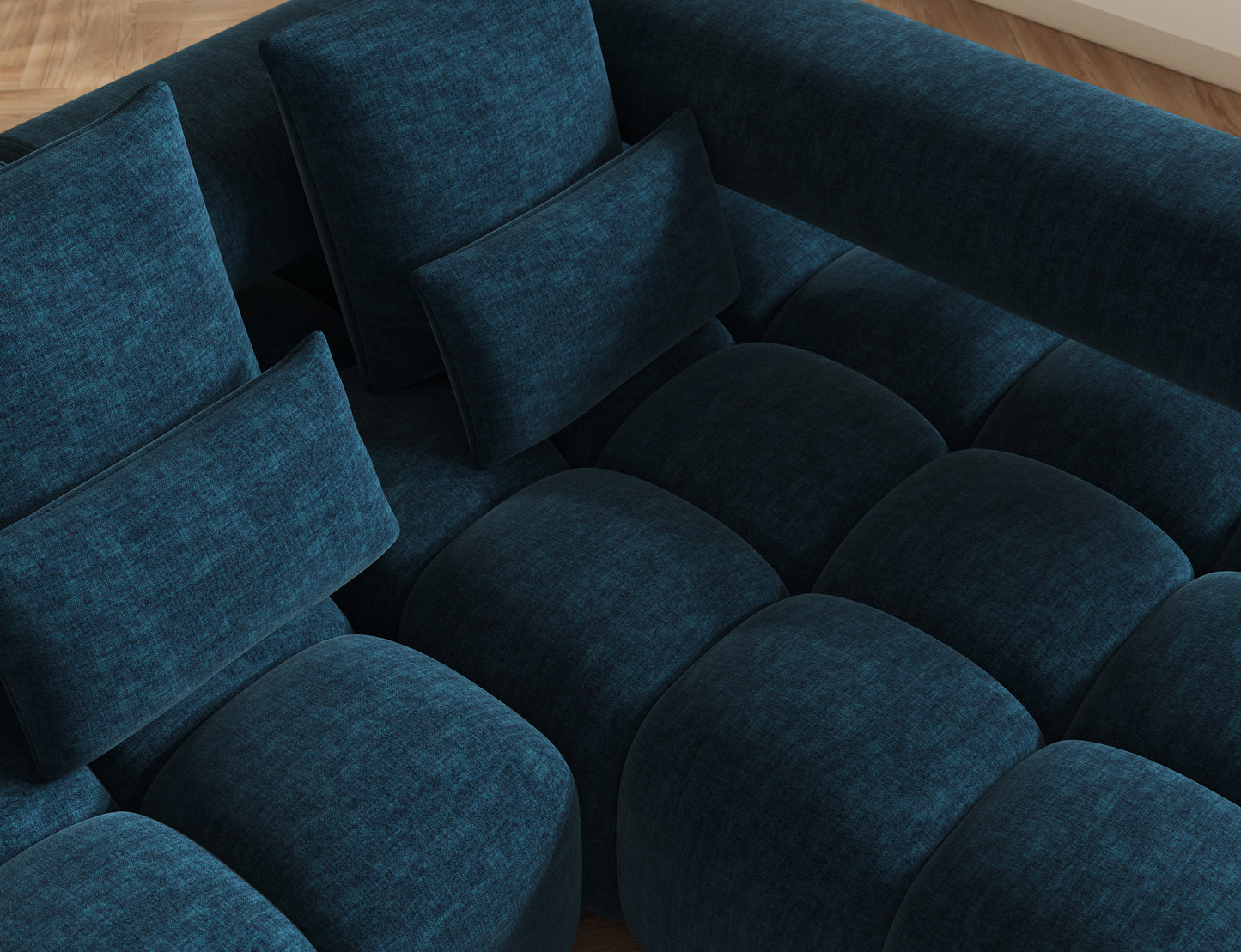 Zbliżenie na siedzisko narożnika Levvi Manhattan 40, granatowa tkanina o subtelnym splocie, podkreślająca nowoczesną formę.