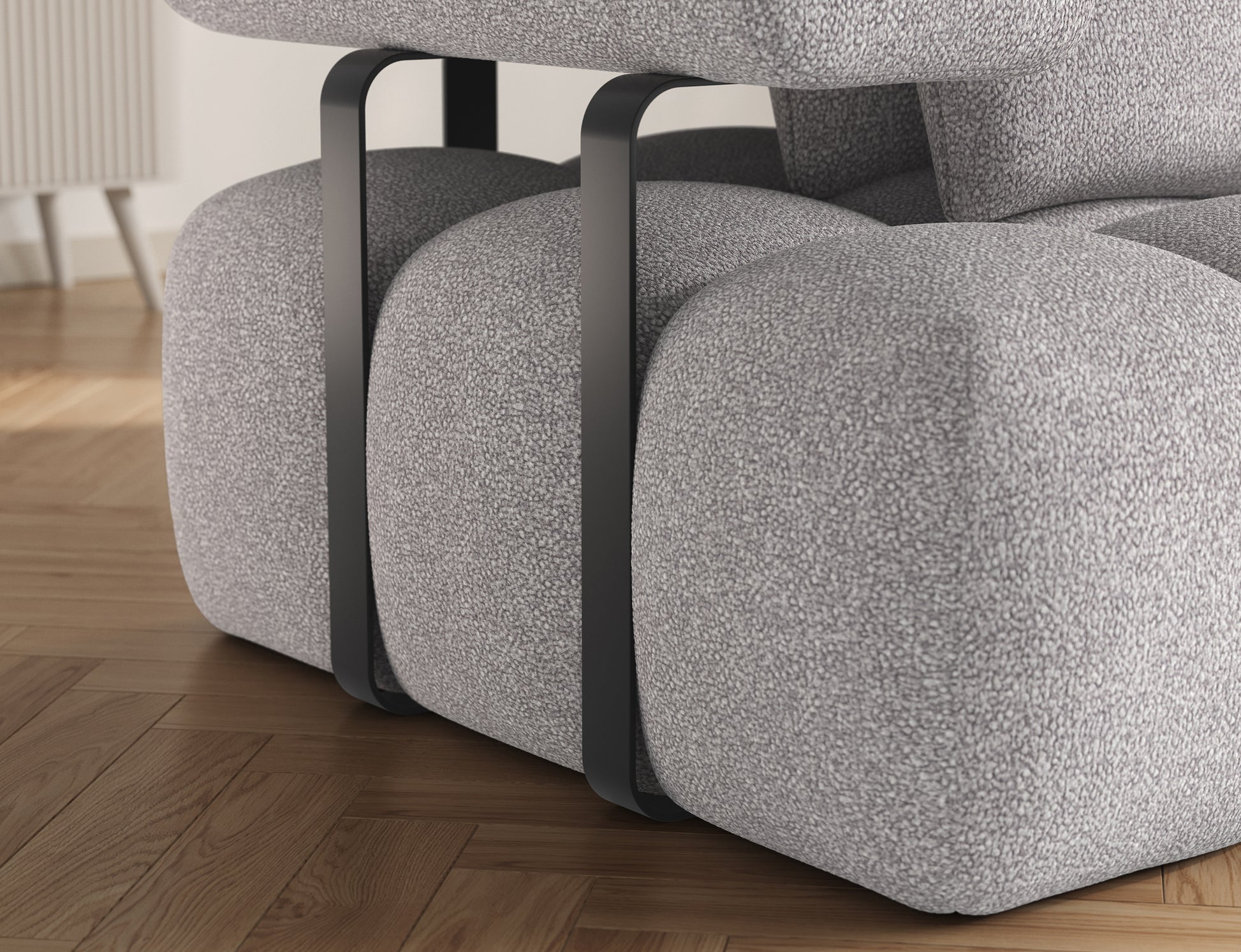 Zbliżenie na boczną konstrukcję narożnika Levvi Paolli 04 szary – solidne metalowe wsporniki podkreślają nowoczesny styl.