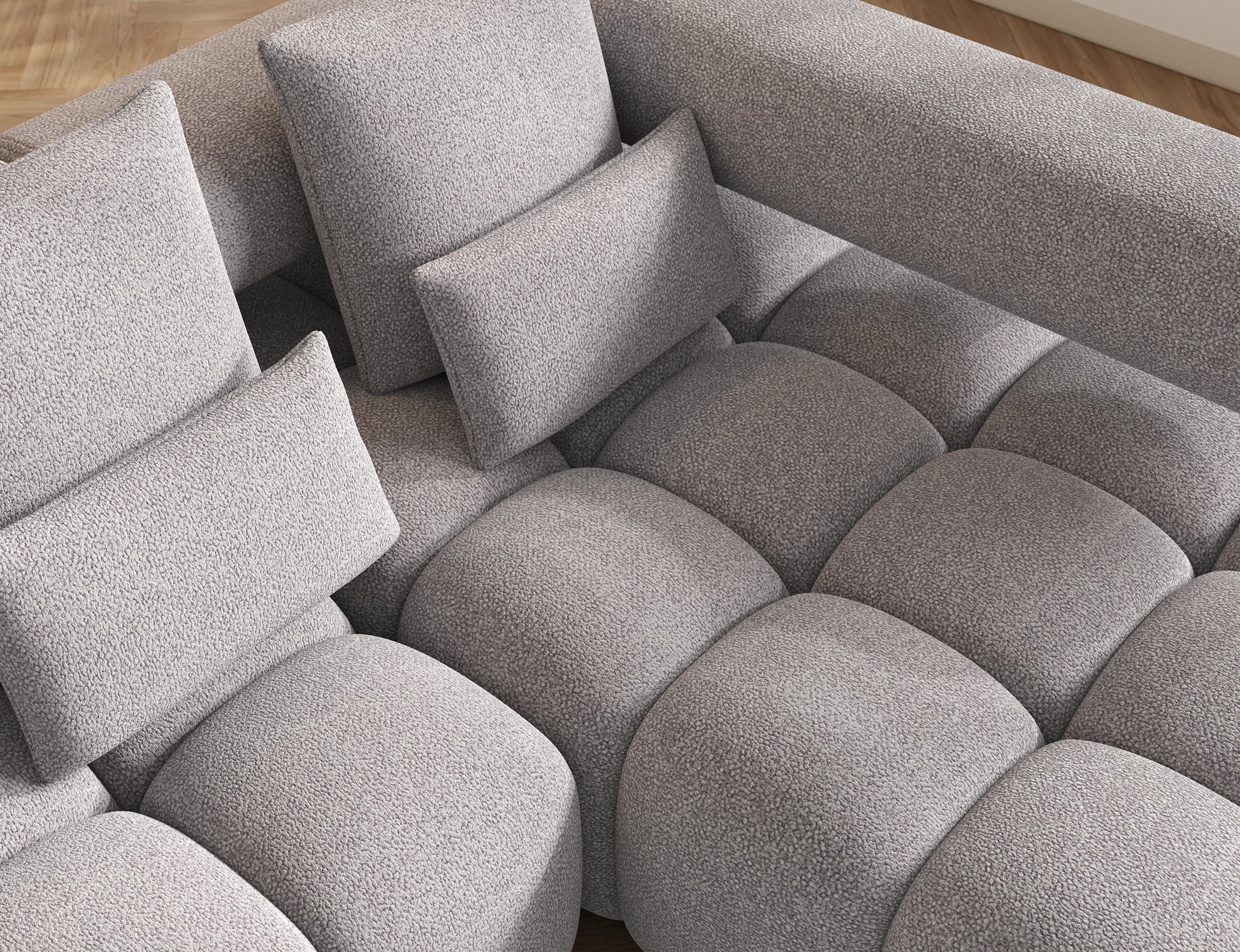 Szczegół tkaniny narożnika Levvi w odcieniu Paolli 04 szary – wysoka jakość i elegancka struktura materiału.