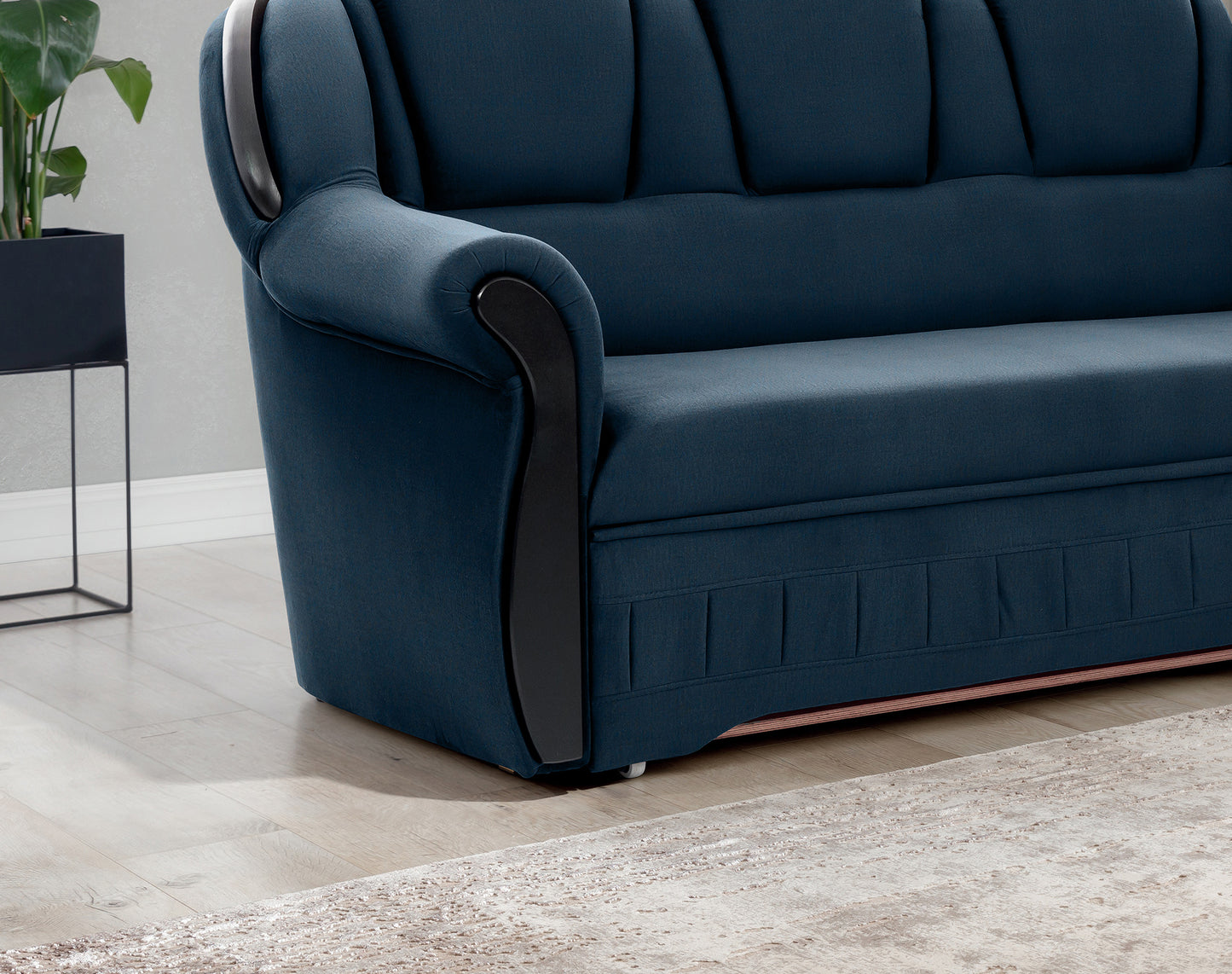Narożnik Lord Monolith 77 granatowy podłokietnik i oparcie w aranżacji salonu