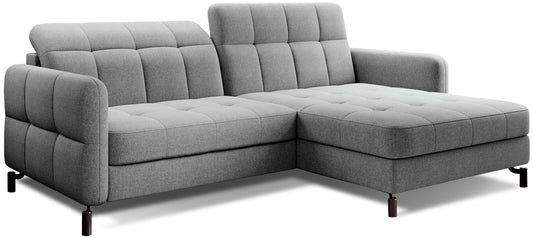 Szary narożnik Lorelle Inari 91 w układzie prawym na białym tle, z pikowanymi poduszkami oparcia i prostymi podłokietnikami.