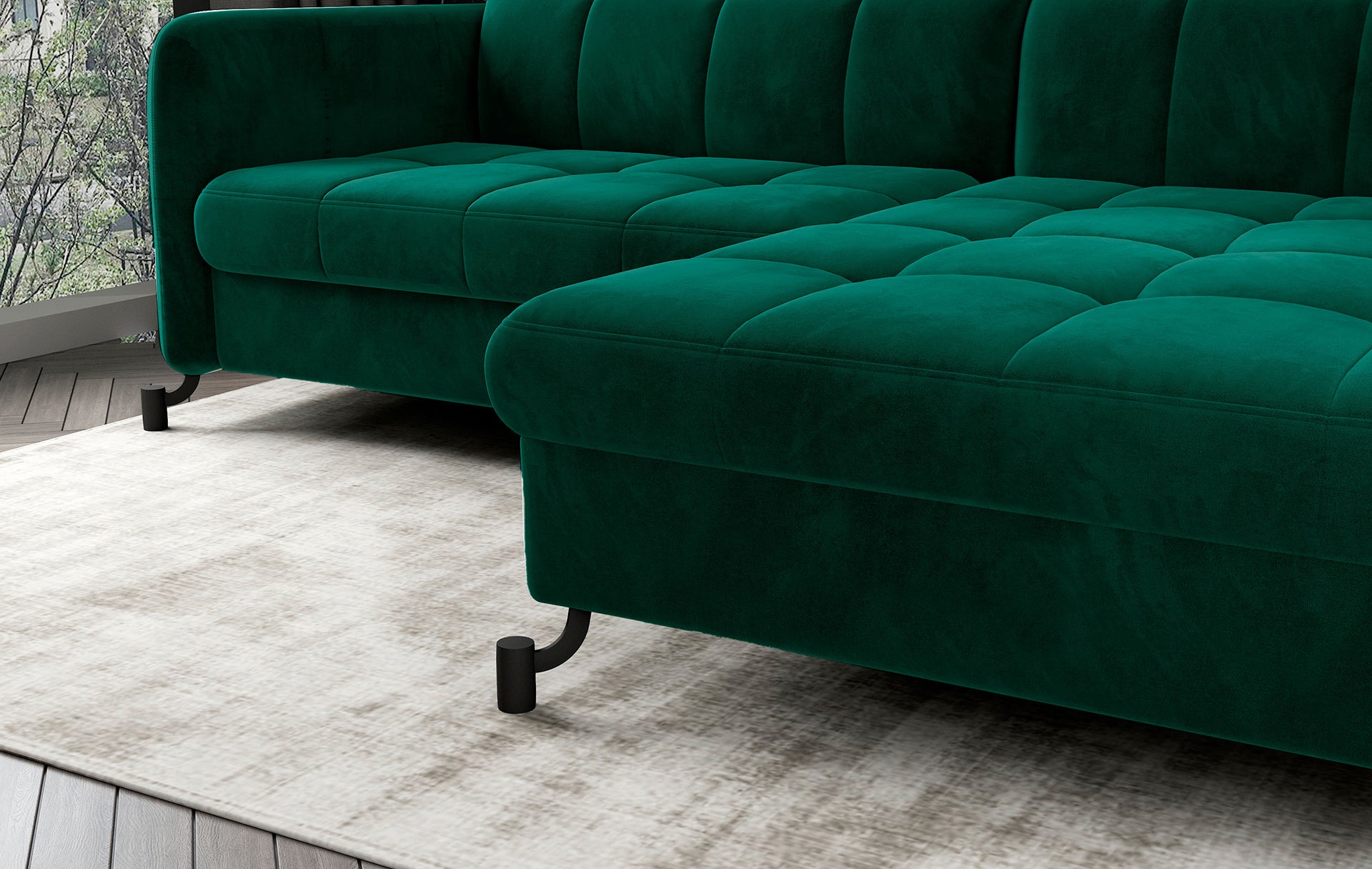 Zbliżenie na siedzisko i metalowe nóżki narożnika Lorelle w kolorze Monolith 37 zielony.