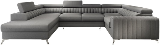 Narożnik Louis w kolorze Flores 05 ciemny szary w układzie lewym, elegancka sofa modułowa z wysokimi metalowymi nogami, widok frontalny na białym tle.