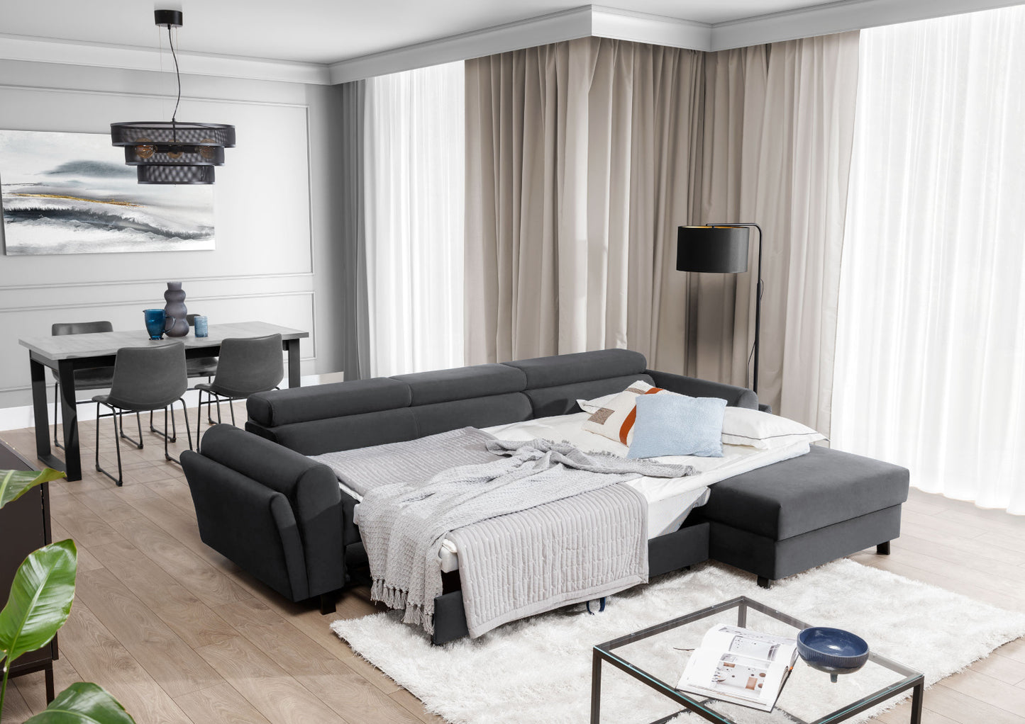 Ciemnoszary narożnik Mariall Monolith 97 w wersji prawostronnej z funkcją spania, rozkładana sofa narożna w nowoczesnym salonie, oferująca dużą powierzchnię do snu i wygodne miejsce do codziennego relaksu dla całej rodziny
