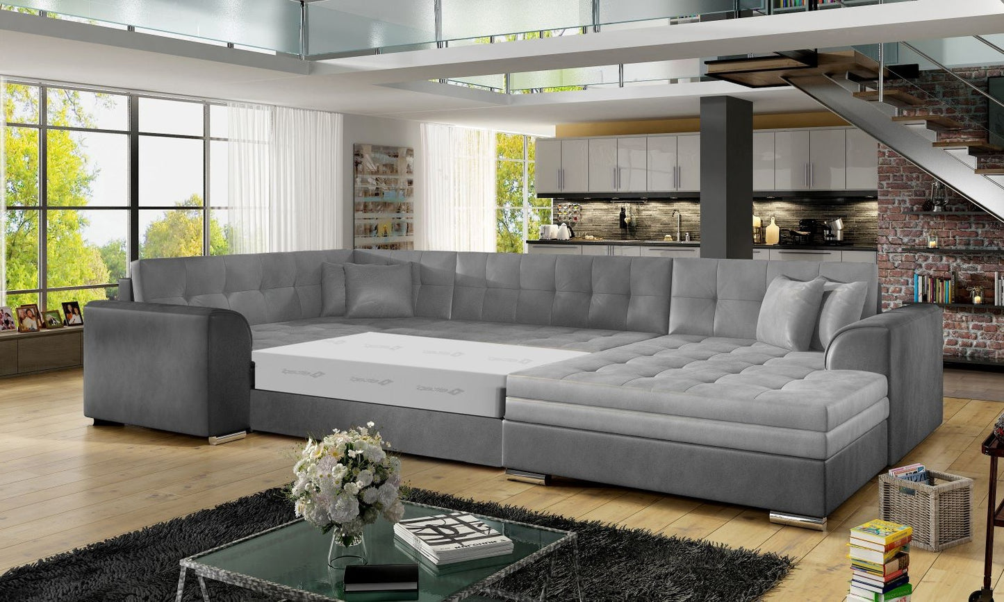 Narożnik Damario w kolorze jasnoszarym i ciemnoszarym z rozłożoną funkcją spania, prezentacja przestronnej powierzchni do wypoczynku.