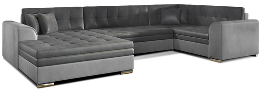 Narożnik Damario w układzie lewym, tapicerowany tkaniną Monolith 97 ciemnoszary z bokami w Monolith 84 jasnoszary, widok na całą bryłę z poduszkami.