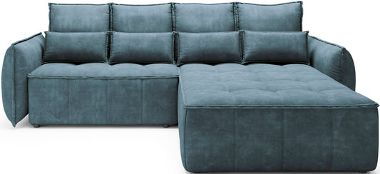 Narożnik Campo w kolorze Toscany 40 niebieski w układzie prawym – frontalny widok na białym tle z pikowanym siedziskiem i zaokrąglonymi podłokietnikami.