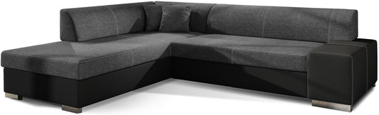 Nowoczesny narożnik Porto w zestawieniu ciemnoszarej tkaniny Sawana 05 oraz czarnej Soft 11 tworzy elegancki i wyrazisty kontrast, oferując wygodne siedziska oraz funkcjonalną przestrzeń do codziennego wypoczynku w salonie