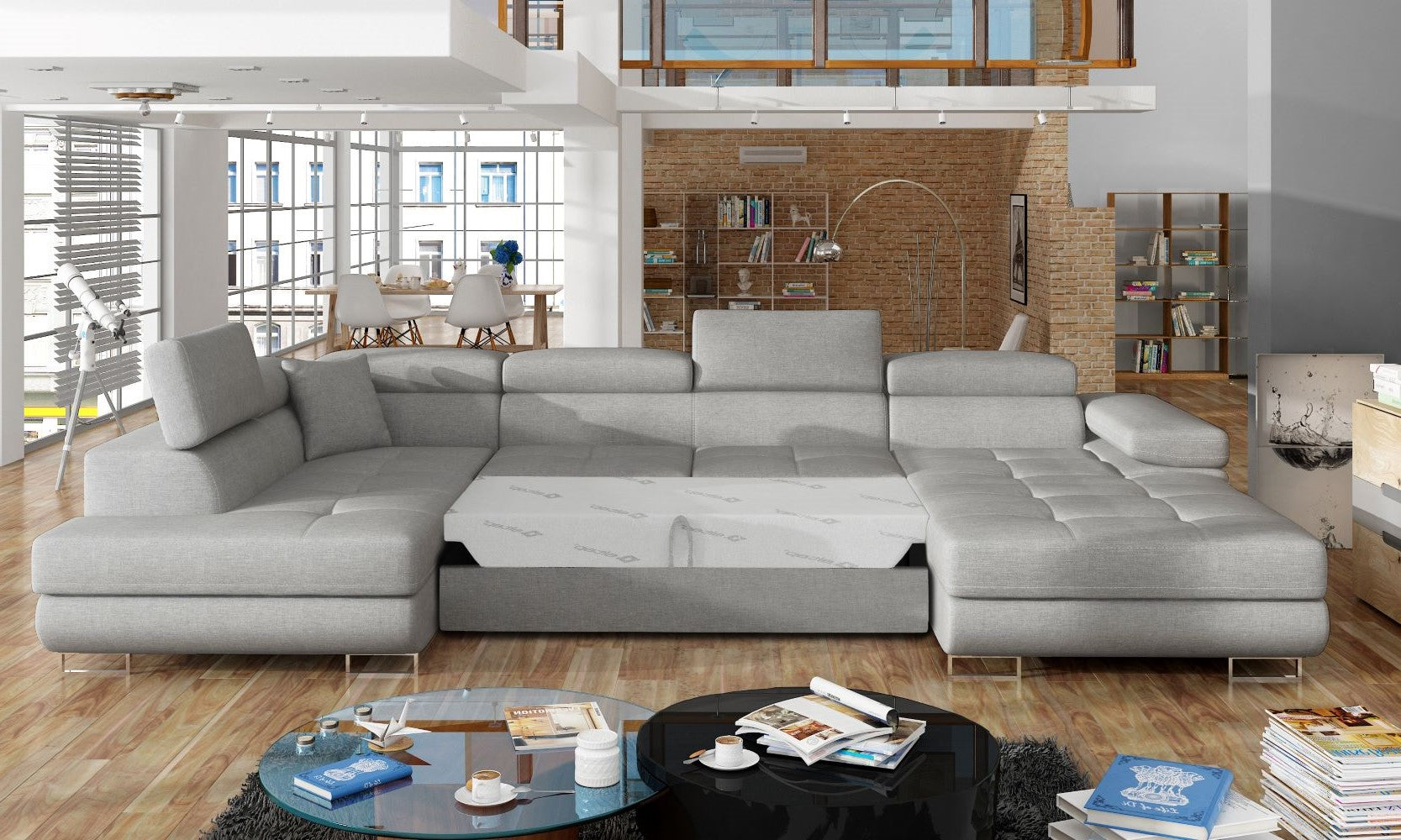 Narożnik Rodrigo Cover 83 szary w układzie lewym z rozłożoną funkcją spania w jasnym salonie.