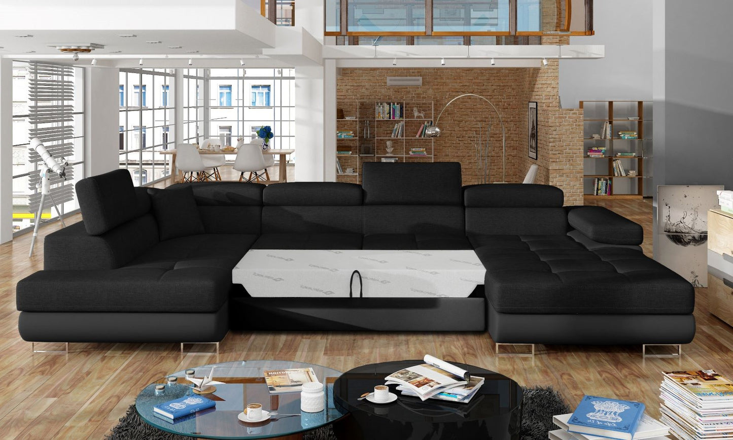 Narożnik Rodrigo Sawana 14 czarny / Soft 11 w układzie lewym z rozłożoną funkcją spania w jasnym salonie.