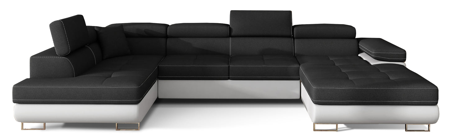 Narożnik Rodrigo w układzie lewym, tapicerowany w tkaninie Sawana 14 czarny i Soft 17, widok frontalny na białym tle.