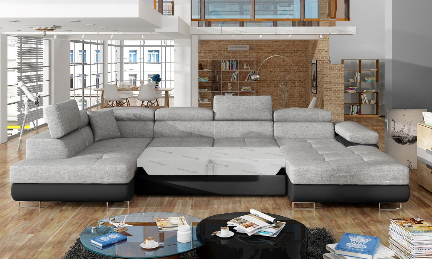 Narożnik Rodrigo Sawana 21 szary / Soft 11 w układzie lewym z rozłożoną funkcją spania w jasnym salonie.