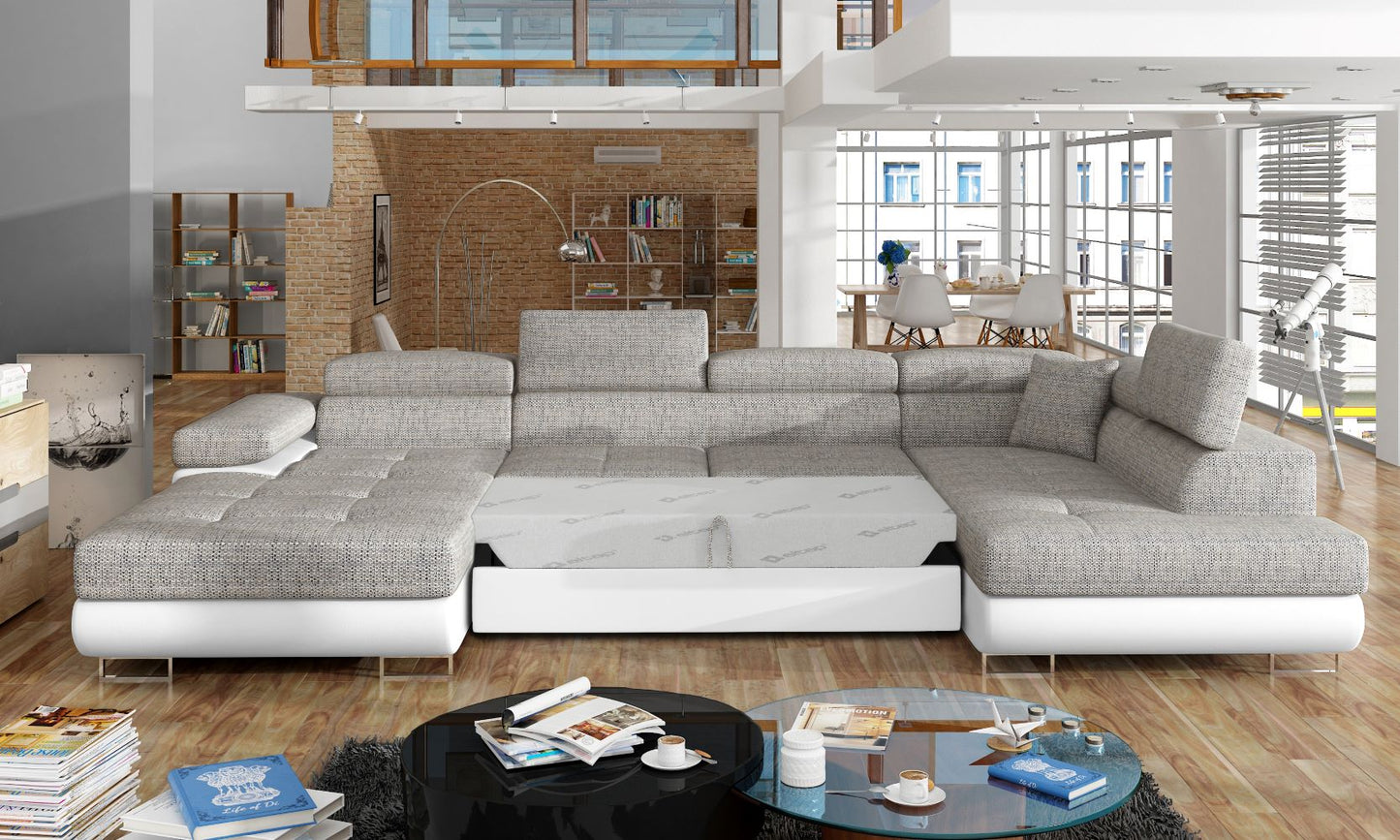 Narożnik Rodrigo Berlin 01 szary / Soft 17 biały w układzie prawym z wysuniętą funkcją spania w jasnym salonie.