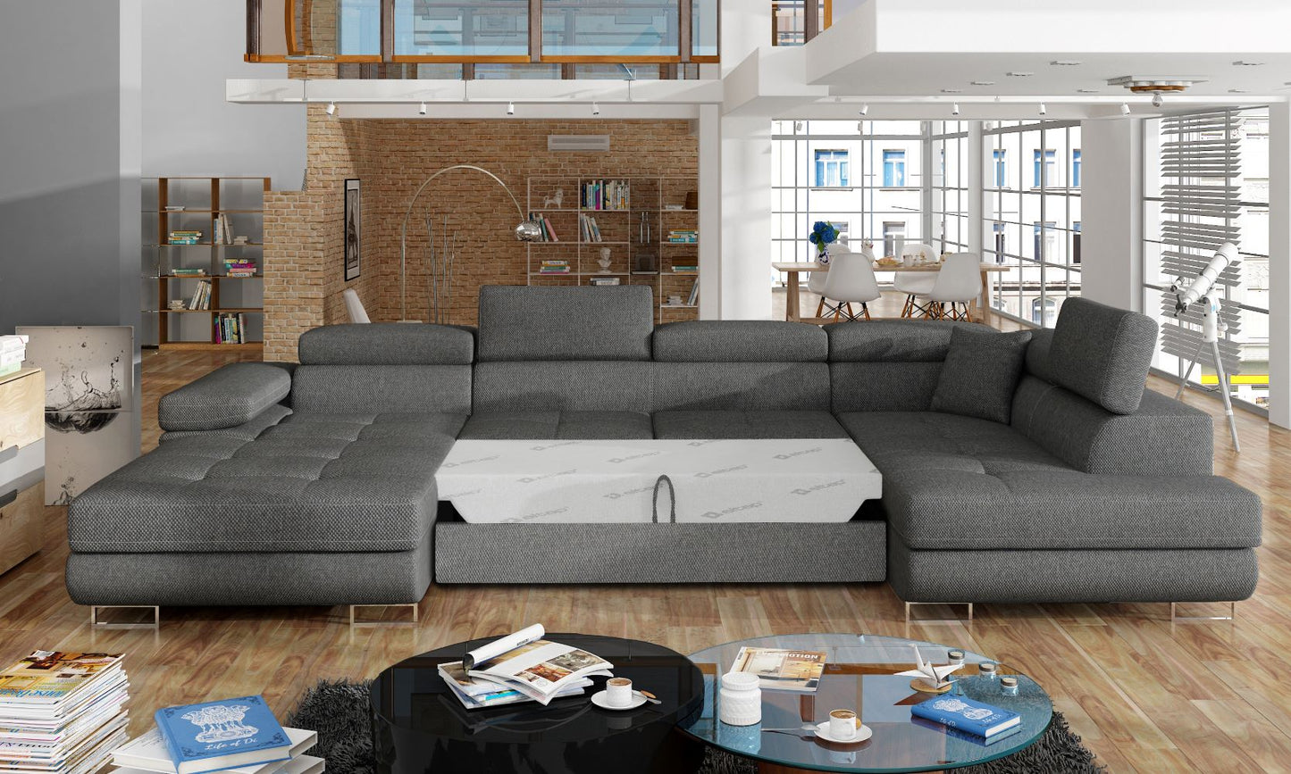 Narożnik Rodrigo Inari 96 ciemnoszary w układzie prawym z rozłożoną funkcją spania w jasnym salonie.