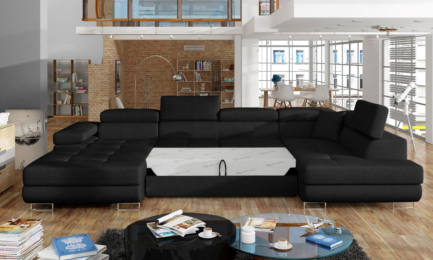 Narożnik Rodrigo Sawana 14 czarny w układzie prawym z rozłożoną funkcją spania w jasnym salonie.