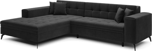 Ciemnoszary narożnik Solange lewy w tkaninie Monolith 97 to nowoczesna sofa do salonu z pikowanym siedziskiem i miękkimi poduszkami, która zapewnia wysoki komfort oraz elegancki wygląd wnętrza.