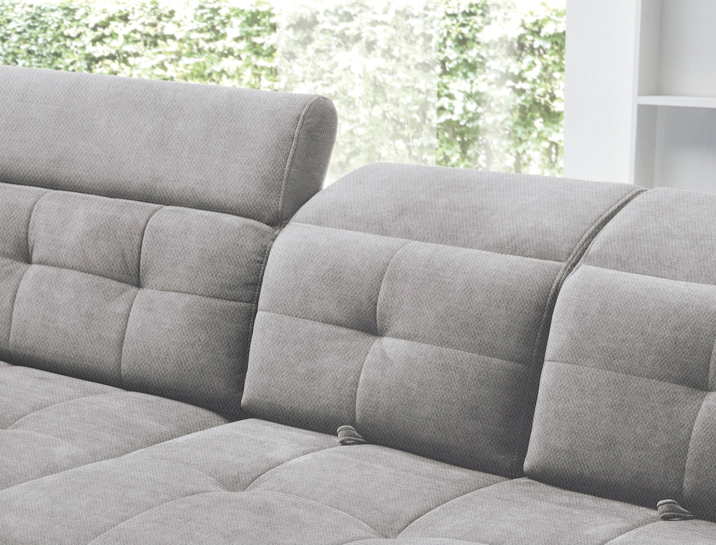 Zbliżenie na regulowany zagłówek oparcia narożnika Inferne Raquel 04 szary, pokazujące mechanizm pochylania.