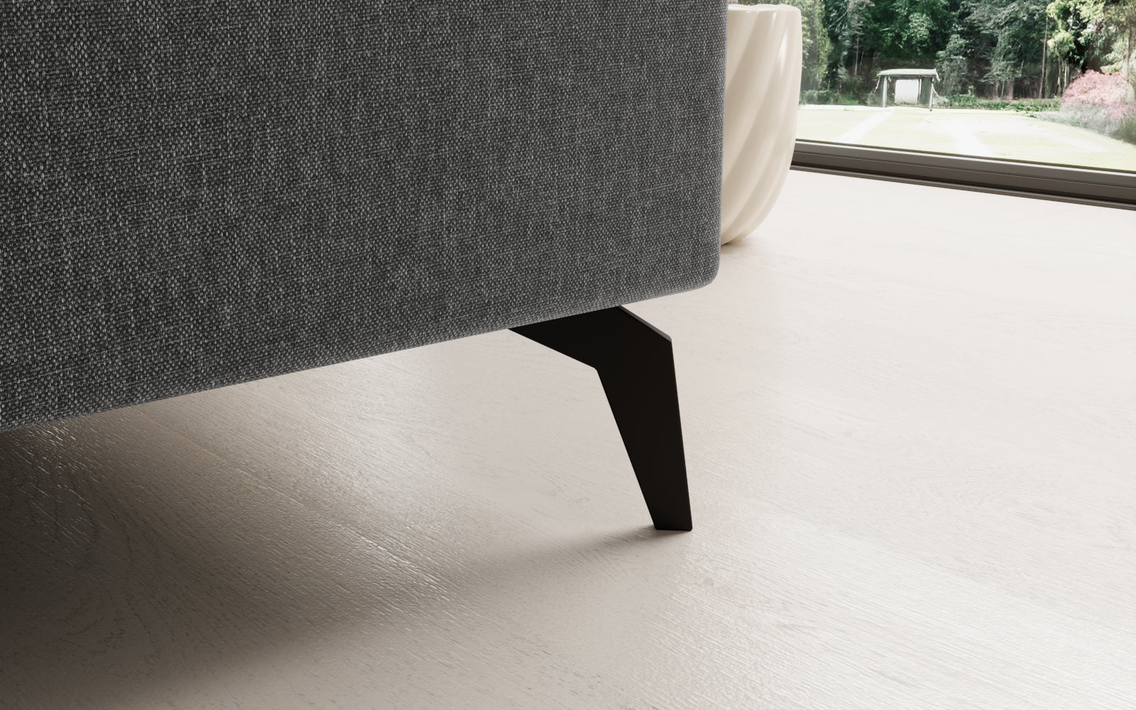 Elegancki narożnik Solange lewy w jasnoszarym wykończeniu Sawana 21 to komfortowy mebel do salonu, idealny dla rodzin, które szukają stylowego i funkcjonalnego miejsca do wspólnego relaksu.
