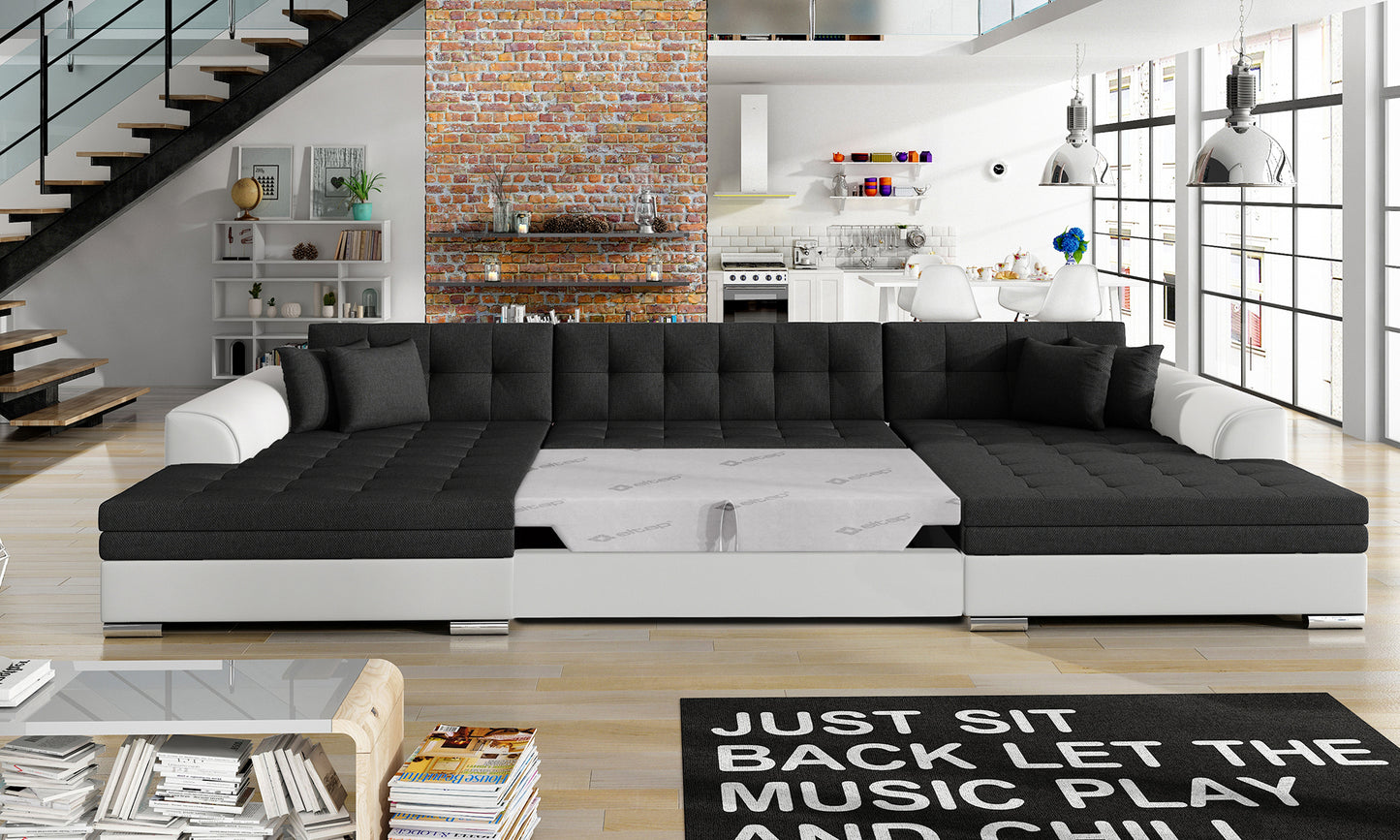 Narożnik Vento – Inari 100 czarny, Soft 17 biały, rozłożona funkcja spania.