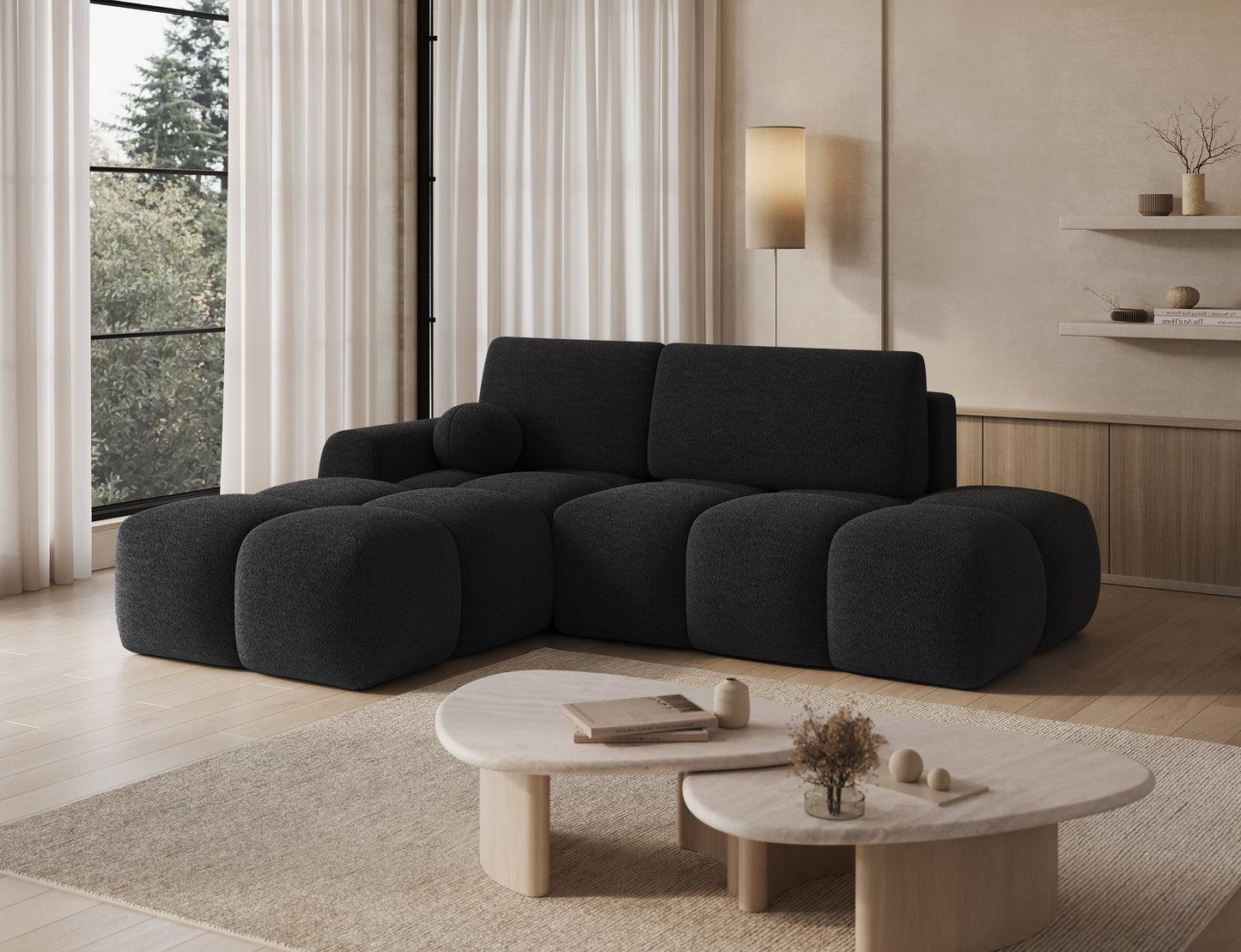 Designerski narożnik Vittario lewy w tkaninie Royal 05 antracyt, prezentowany w eleganckiej aranżacji salonu z miękkimi modułowymi formami.