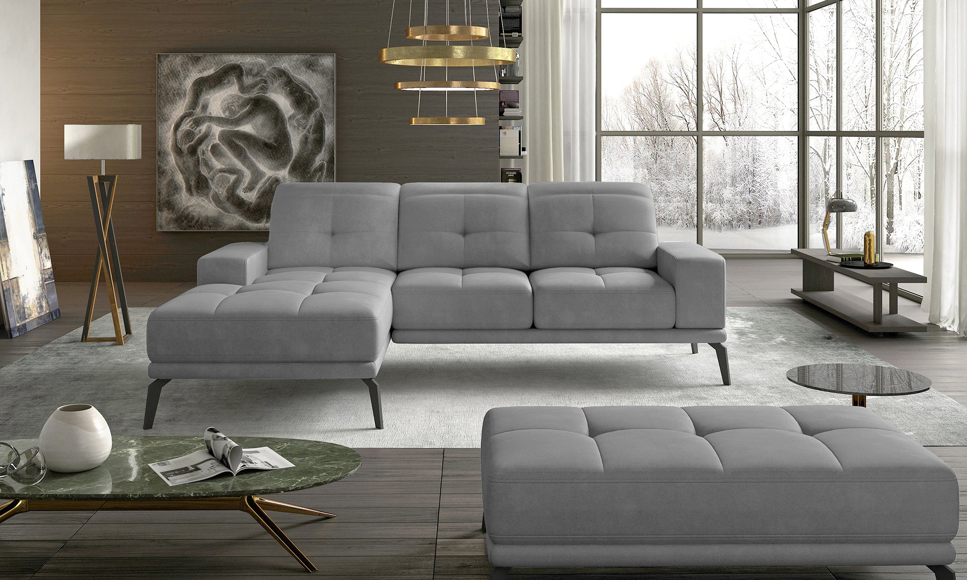 Lewostronny narożnik Torrense wykonany w jasnoszarej tkaninie Paros 05 prezentujący minimalistyczną formę oraz miękkie siedziska. Designerski narożnik do salonu zapewniający wygodę i elegancki wygląd wnętrza.