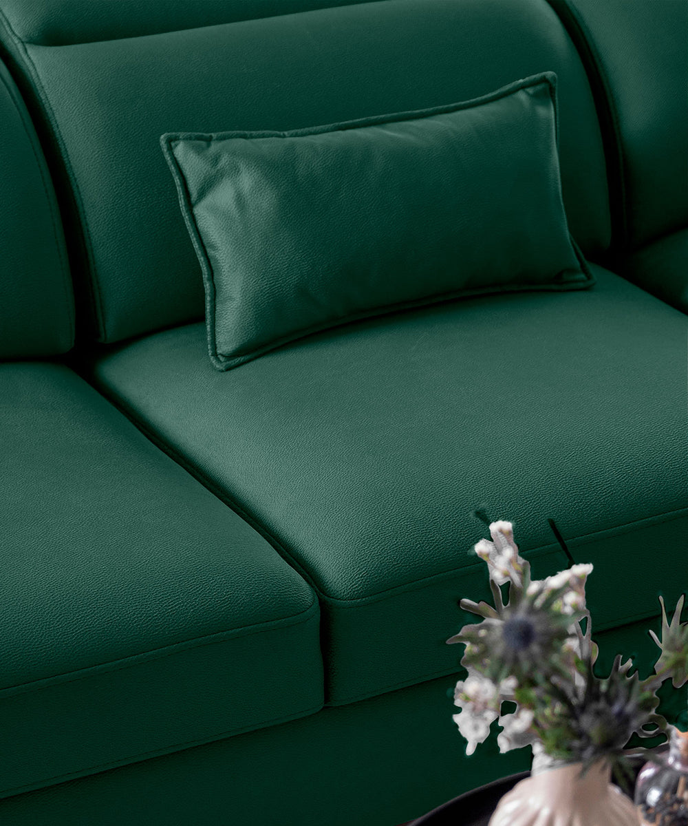 Narożnik Noble Nube 35 w eleganckim zielonym kolorze prezentujący praktyczny schowek, regulowane zagłówki oraz smukłe czarne nóżki. Designerski narożnik wypoczynkowy do nowoczesnego salonu inspirowanego stylem contemporary.