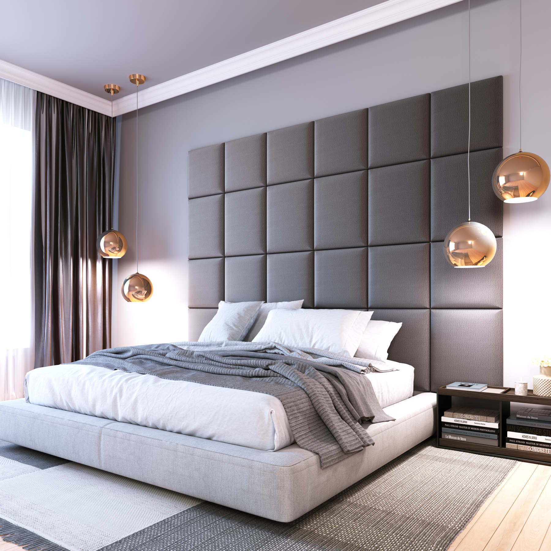 Nowoczesna sypialnia z zagłówkiem z paneli Quadratta I Monolith 85 w szarym odcieniu za łóżkiem, uzupełniona wiszącymi okrągłymi lampami i szarą pościelą.