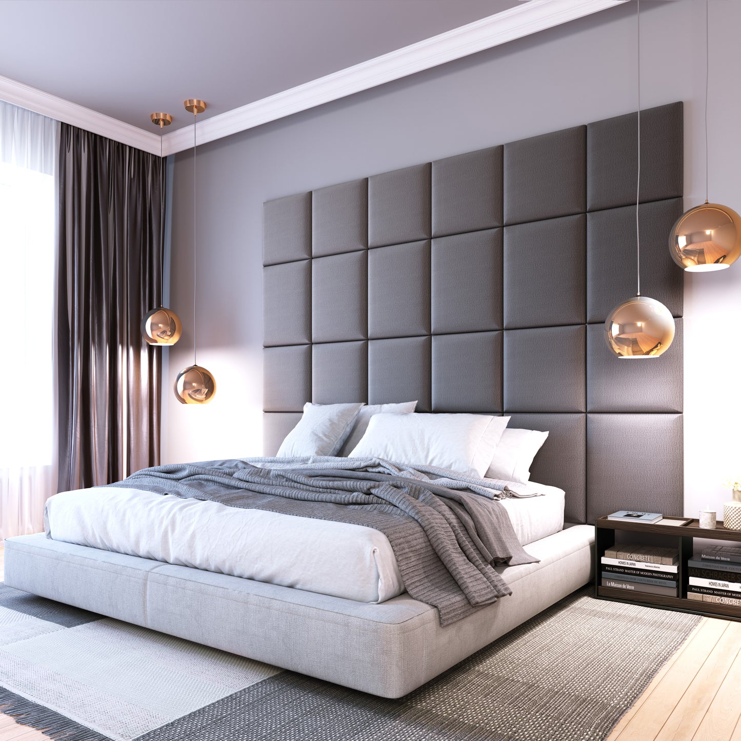 Nowoczesna sypialnia z dużym zagłówkiem z prostokątnych paneli Quadratta IV Monolith 85 w szarym kolorze za niskim łóżkiem, udekorowana wiszącymi kulistymi lampami i szarą pościelą.