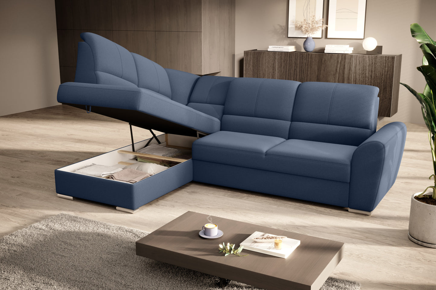Duży narożnik Siber lewy w tkaninie Gojo 40 w kolorze niebieskim to komfortowa sofa wypoczynkowa, która łączy funkcjonalność z uniwersalnym i przyjemnym dla oka wyglądem.