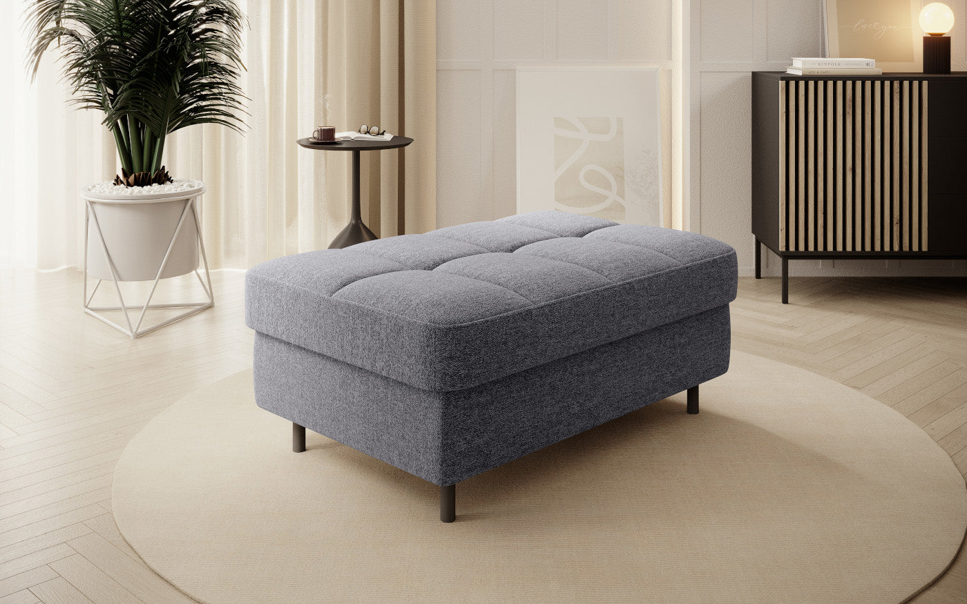 Pufa do siedzenia, prostokątna, ciemnoszara z przeszyciami.