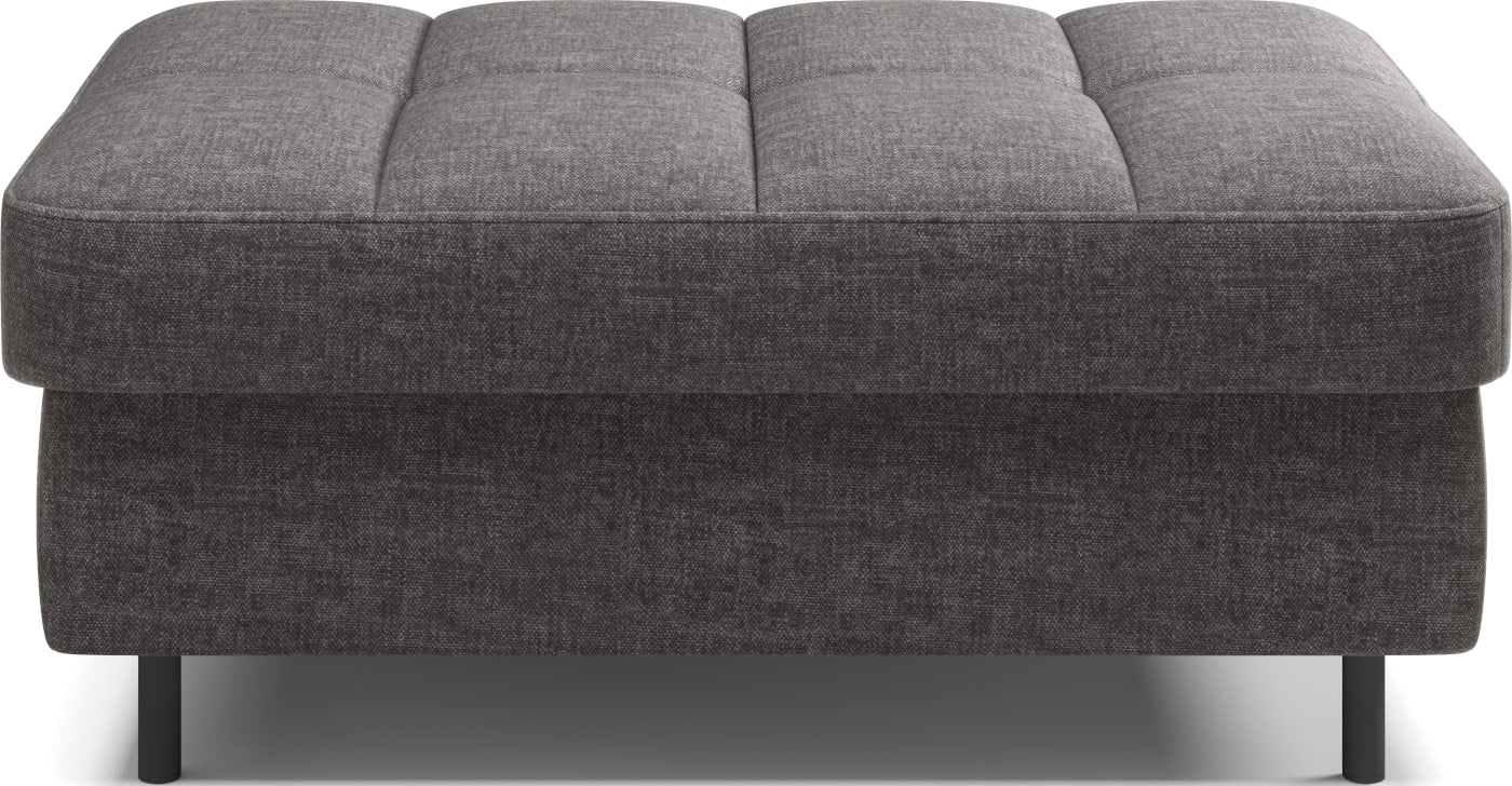 Pufa na białym tle, prostokątna, szara z przeszyciami.