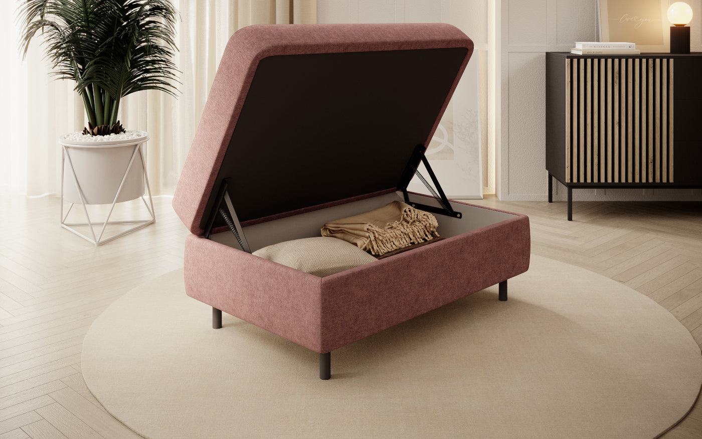 Pufa z pojemnikiem, prostokątna, jasnoróżowa z przeszyciami.