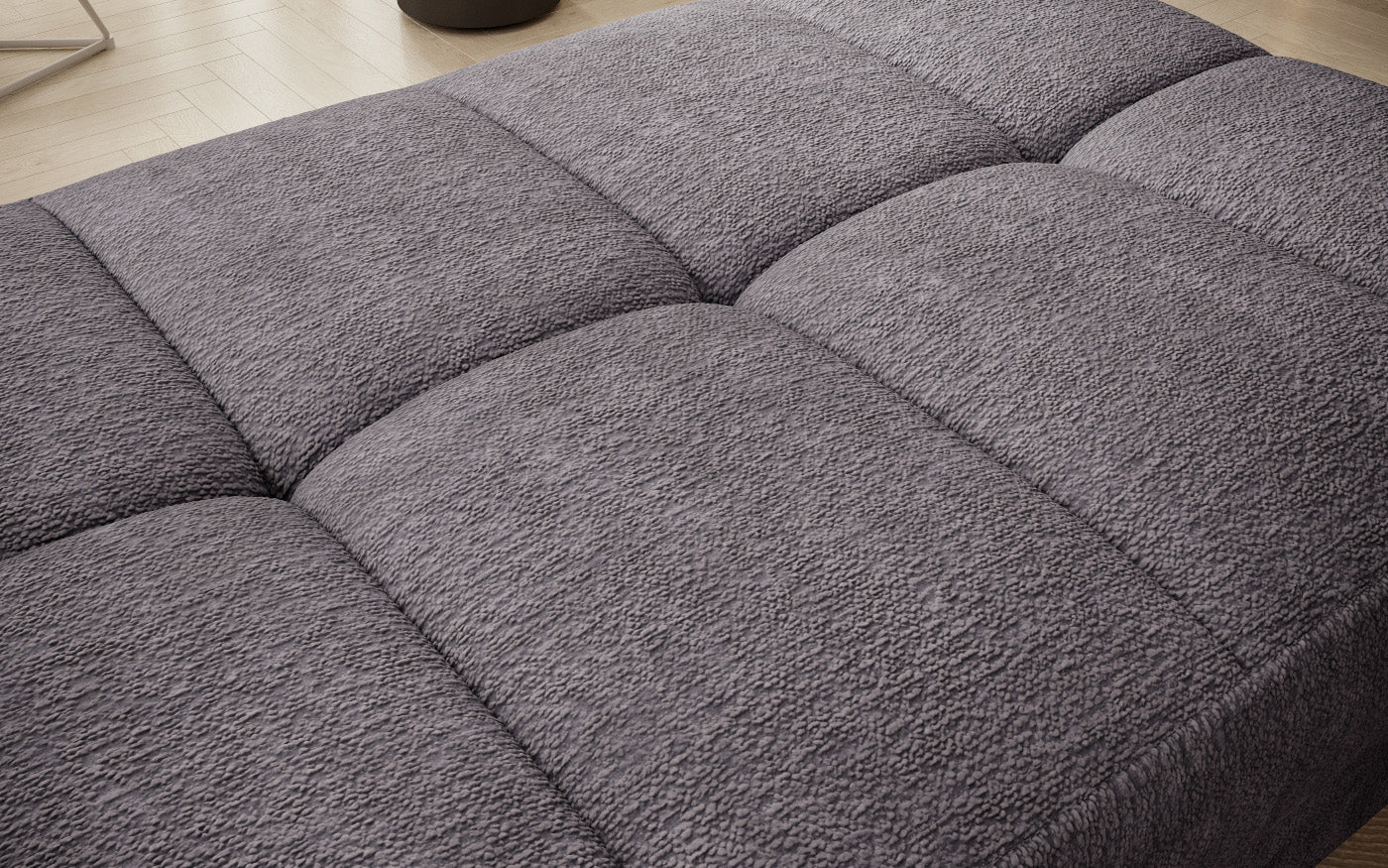 Pufa do siedzenia, prostokątna, szara z przeszyciami, detal siedziska.