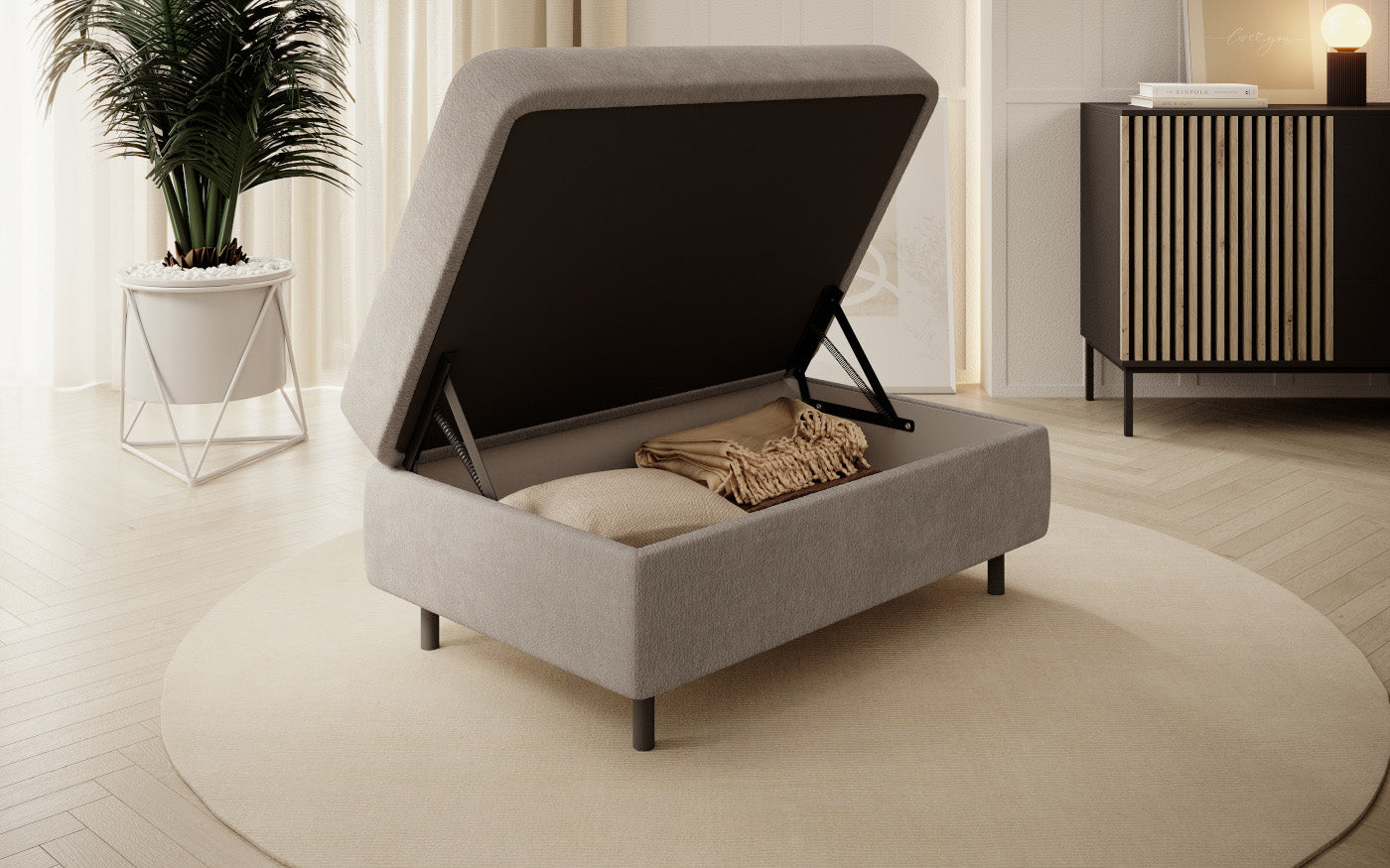 Pufa z pojemnikiem, prostokątna, jasnobeżowa z przeszyciami.