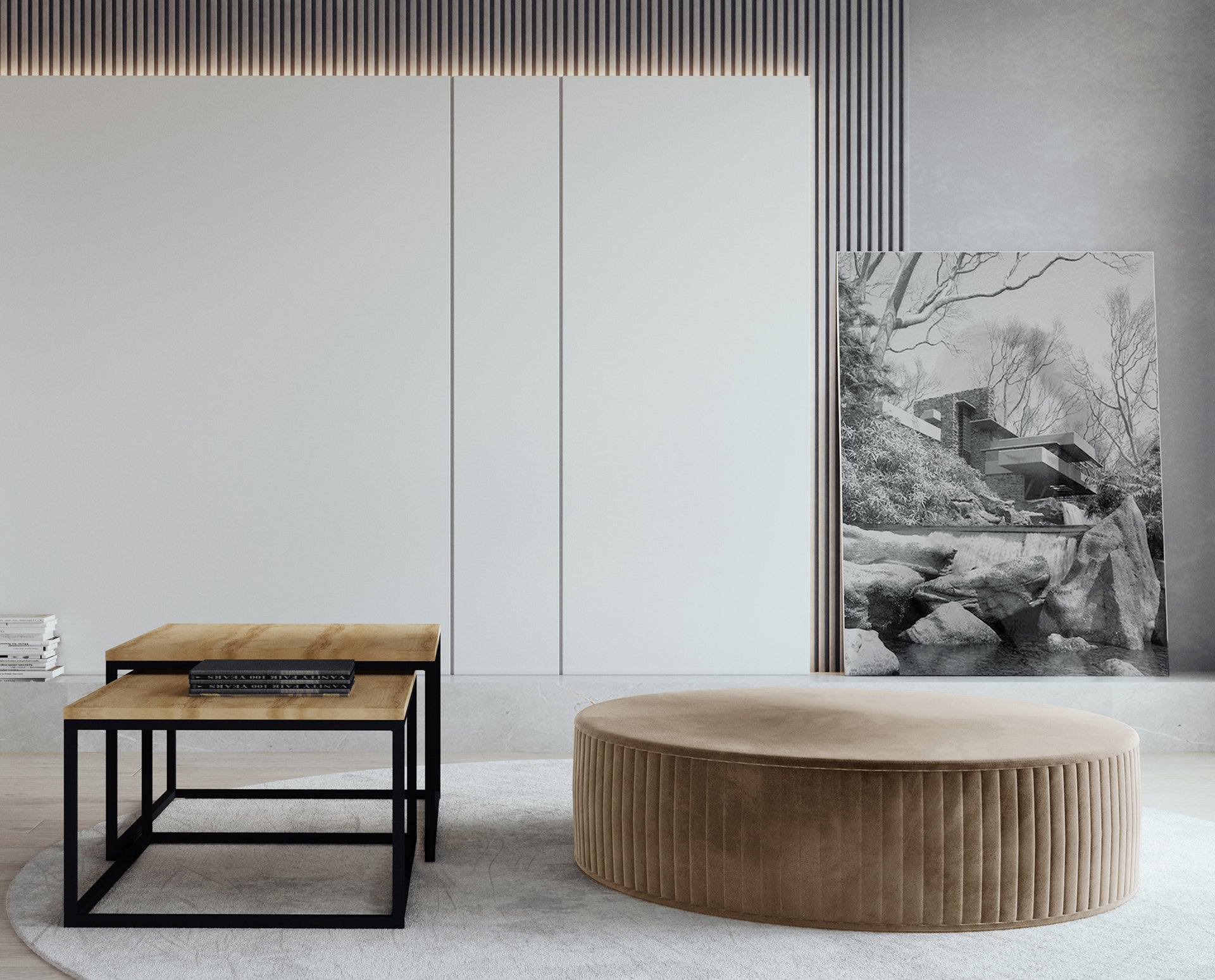 Pufa Lara w kolorze Monolith 09 jasnobrązowy, ustawiona w nowoczesnym salonie obok stolików kawowych z drewnianym blatem i metalową podstawą, na jasnym dywanie.