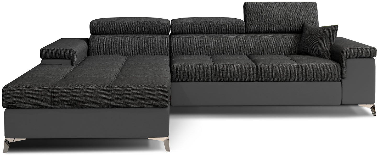 Narożnik Ricardo w układzie lewym, tapicerowany tkaniną Inari 96 ciemnoszary z wykończeniem Soft 29 brązowy, z regulowanymi zagłówkami i szerokimi podłokietnikami, prezentowany na białym tle.