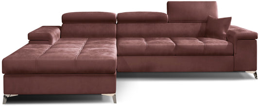 Narożnik Ricardo w tkaninie Monolith 63 różowy, układ lewy – widok z przodu – elegancka sofa narożna w kształcie litery L z szerokim szezlongiem po lewej stronie, regulowanymi zagłówkami i ozdobnym pikowaniem siedziska.