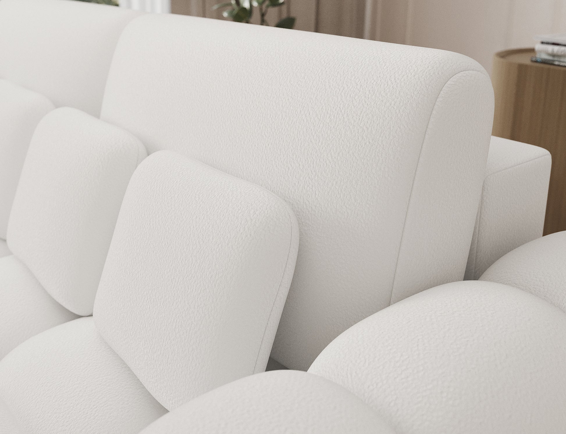 Zbliżenie na miękkie oparcie Big Sofy Cotonn w białej tkaninie Paolli 01 – komfort i elegancja w nowoczesnym stylu.