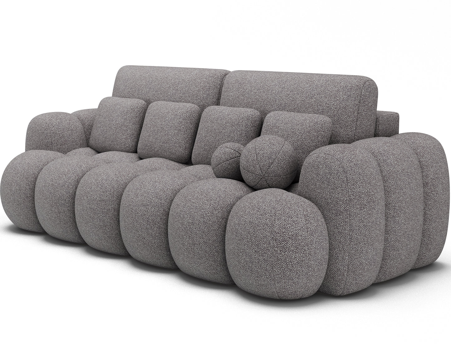 Big Sofa Cotonn w tkaninie Paolli 04 szary, widok z ukosa na miękką bryłę z poduszkami o nieregularnych kształtach i masywnych bokach.